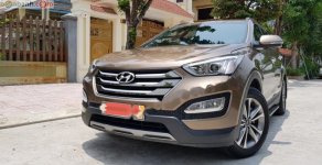 Hyundai Santa Fe 2.2L 2015 - Cần bán lại xe Hyundai Santa Fe 2.2L AT sản xuất năm 2015, màu nâu như mới giá 870 triệu tại Ninh Bình