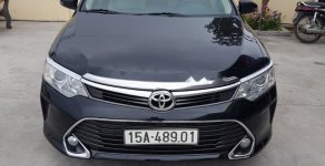 Toyota Camry   2015 - Cần bán Toyota Camry 2.0E sản xuất năm 2015, màu đen, 735 triệu giá 735 triệu tại Hải Dương