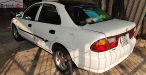 Mazda 323   1998 - Bán ô tô Mazda 323 đời 1998, màu trắng xe gia đình giá 89 triệu tại Long An