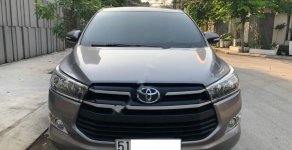 Toyota Innova 2.0E 2017 - Cần bán gấp Toyota Innova 2.0E năm 2017 xe gia đình giá cạnh tranh giá 635 triệu tại Tp.HCM
