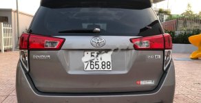 Toyota Innova 2.0E 2017 - Cần bán lại xe Toyota Innova 2.0E 2017, màu nâu giá 572 triệu tại Bình Dương