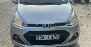 Hyundai Grand i10 2015 - Cần bán gấp Hyundai Grand i10 2015, màu bạc, nhập khẩu nguyên chiếc chính chủ giá 218 triệu tại Bình Dương