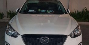 Mazda CX 5 2014 - Cần bán xe Mazda CX 5 năm sản xuất 2014, màu trắng chính chủ giá 650 triệu tại Tp.HCM