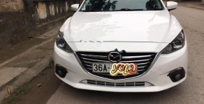 Mazda 3 1.5 AT 2015 - Cần bán gấp Mazda 3 1.5 AT đời 2015, màu trắng giá 530 triệu tại Thanh Hóa