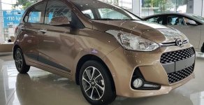 Hyundai Grand i10 1.2MT 2020 - Hyundai Giải Phóng - Bán nhanh chiếc Hyundai Grand i10 1.2MT sản xuất 2020, màu nâu vàng giá 323 triệu tại Hà Nội