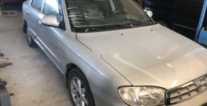 Kia Spectra 2005 - Cần bán gấp Kia Spectra sản xuất 2005, màu bạc số sàn, giá chỉ 98 triệu giá 98 triệu tại Bình Định