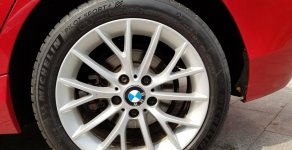 Bán xe gia đình BMW 116i, đời 2014, đăng ký 6/2015, màu Đỏ, nhập khẩu Đức, giá 639 triệu. giá 639 triệu tại Tp.HCM