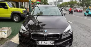 BMW 218i 2015 - Cần bán xe BMW 218i  sản xuất 2015, màu nâu, xe nhập, xe đẹp giá 430 triệu tại Hà Nội