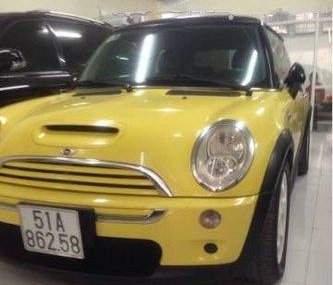 Mini Cooper   AT 2005 - Cần bán gấp Mini Cooper AT đời 2005, màu vàng, xe nhập