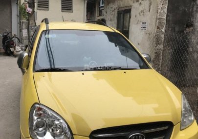 Kia Carens Lx 2010 - Bán xe Kia Carens Lx đời 2010, màu vàng, giá 295tr