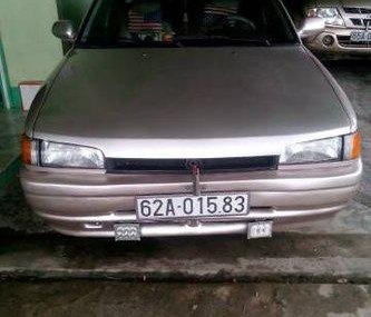 Mazda 323  MT 1995 - Chính chủ bán ô tô Mazda 323 MT đời 1995, màu xám, 80tr