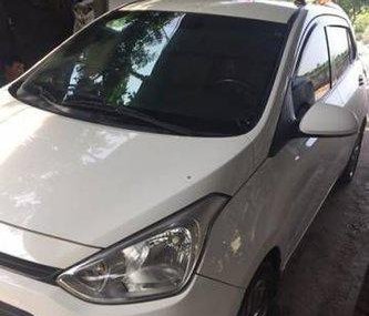 Hyundai i10 MT 2014 - Chính chủ bán Hyundai i10 MT đời 2014, màu trắng