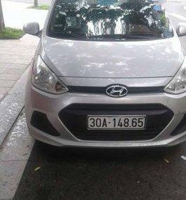 Hyundai i10 MT 2014 - Chính chủ bán Hyundai i10 MT đời 2014, màu trắng