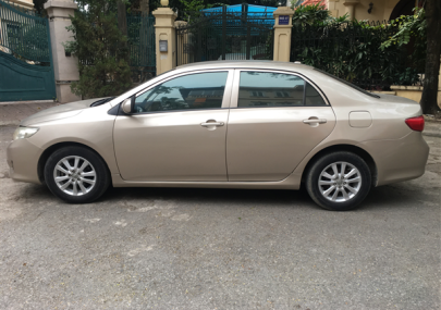 Toyota Corolla LE  2010 - Cần bán xe Toyota Corolla LE đời 2010, màu vàng, nhập khẩu chính hãng