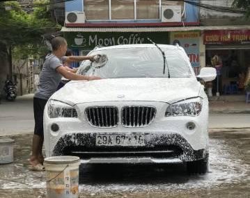 BMW X1   2012 - Bán BMW X1 đời 2012, màu trắng, nhập khẩu nguyên chiếc chính chủ, 900 triệu