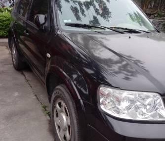 Ford Escape 2005 - Bán ô tô Ford Escape năm 2005, màu đen