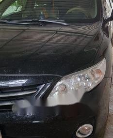 Toyota Corolla altis 1.8T 2013 - Cần bán lại xe Toyota Corolla Altis 1.8T sản xuất 2013, màu đen chính chủ, 570tr