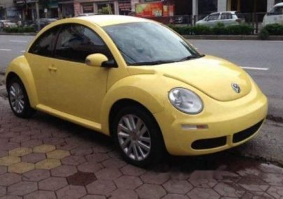 Volkswagen Beetle  2.0AT 2009 - Cần bán Volkswagen Beetle 2009, màu vàng, nhập khẩu, giá chỉ 618 triệu
