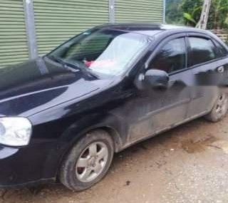 Daewoo Lacetti   EX 1.6 MT  2005 - Cần bán gấp Daewoo Lacetti EX 1.6 MT d sản xuất 2005, màu đen