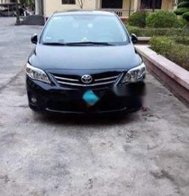 Toyota Corolla altis 2014 - Cần bán xe Toyota Corolla altis sản xuất năm 2014, màu đen