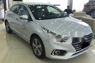 Hyundai Accent   2012 - Bán ô tô Hyundai Accent sản xuất 2012, màu bạc, nhập khẩu nguyên chiếc