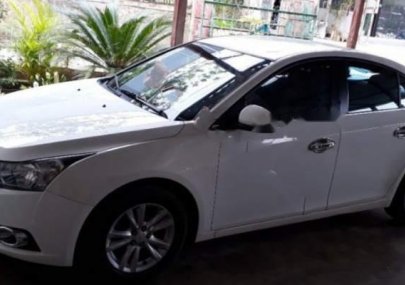 Chevrolet Cruze LS 1.6MT 2014 - Bán Chevrolet Cruze LS 1.6MT đời 2014, màu trắng xe gia đình