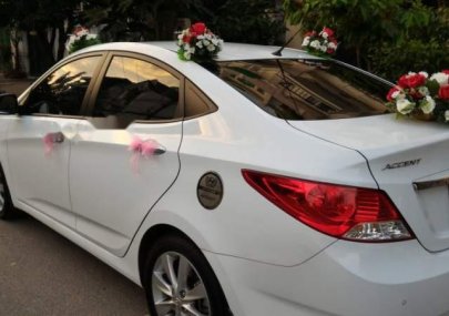 Hyundai Accent 1.4MT 2014 - Bán Hyundai Accent 1.4MT 2014, màu trắng, xe gia đình 