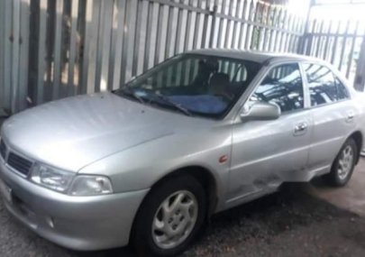 Mitsubishi Lancer 2001 - Bán xe Mitsubishi Lancer sản xuất năm 2001, màu bạc xe gia đình