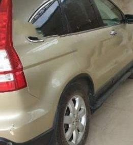 Honda CR V 2007 - Chính chủ bán xe Honda CR V sản xuất 2007, màu vàng số tự động, 455tr